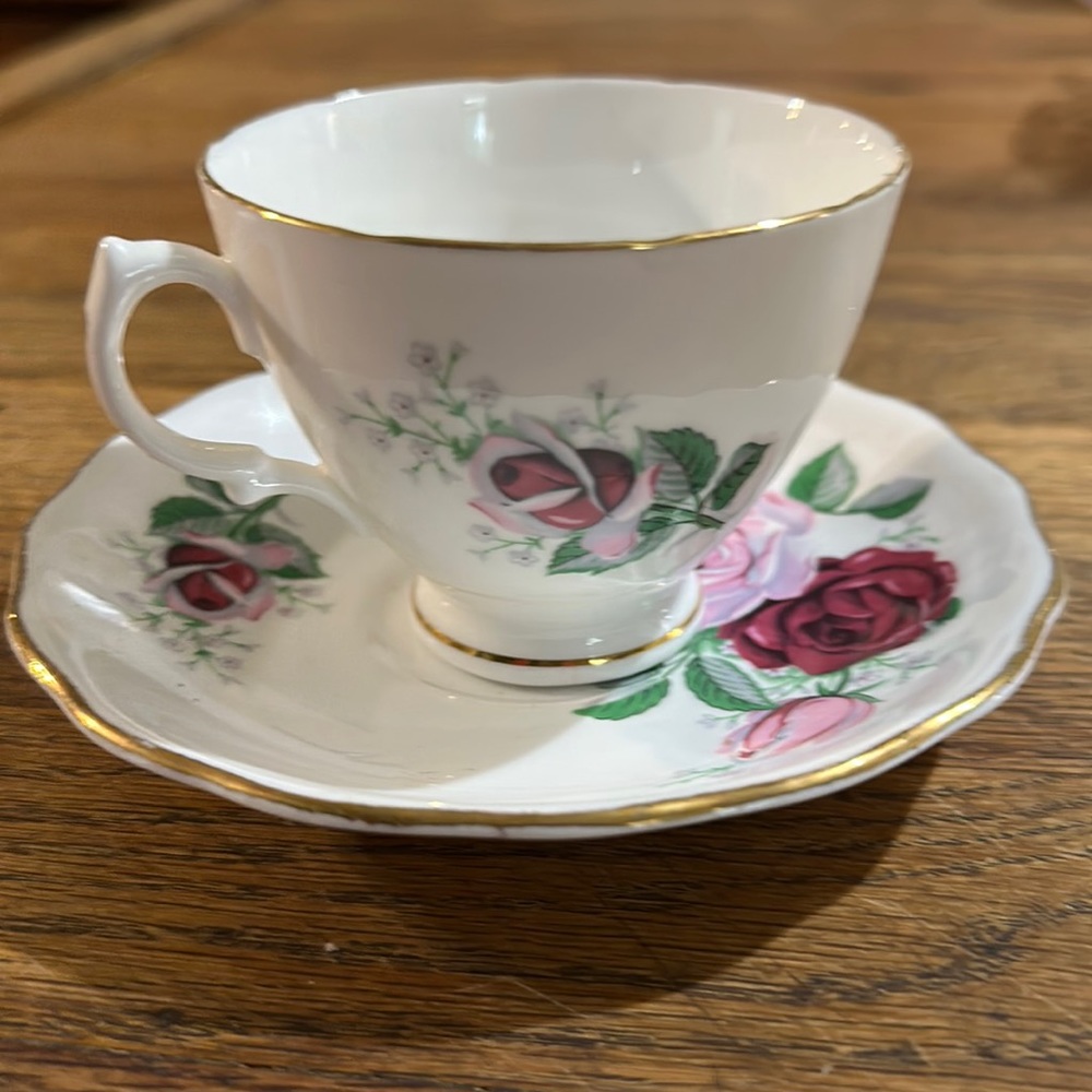 Royal Vale Bone china teacup and saucer with red and pink roses gold trim